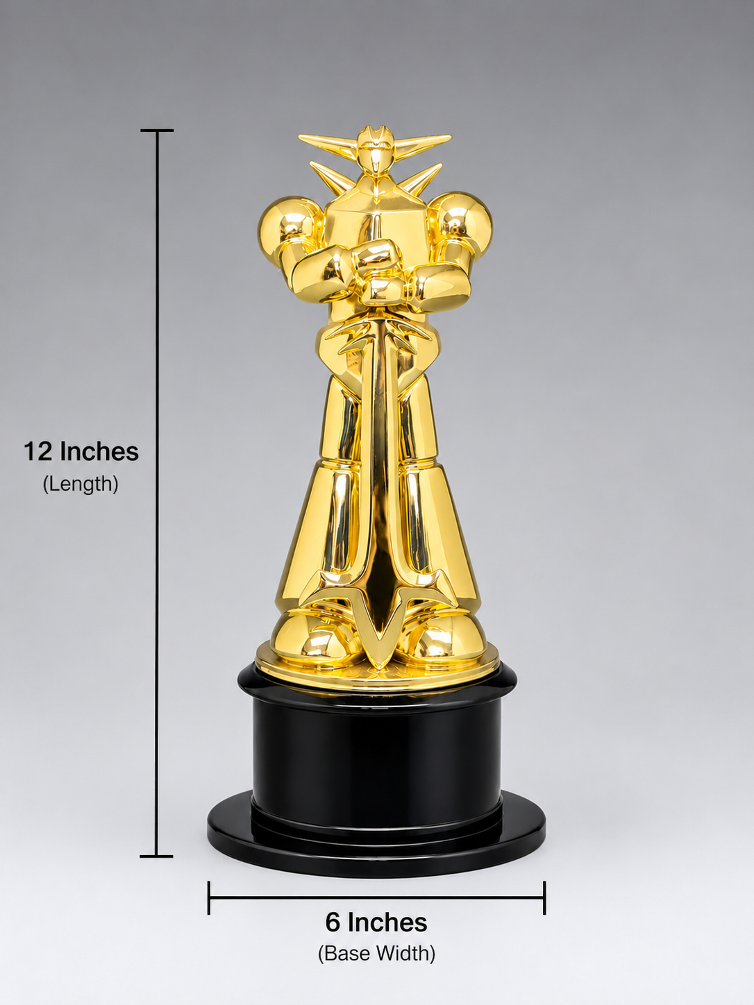 Gold robot figurine on a black base with measurements indicated 6 inches wide, 12 inches long