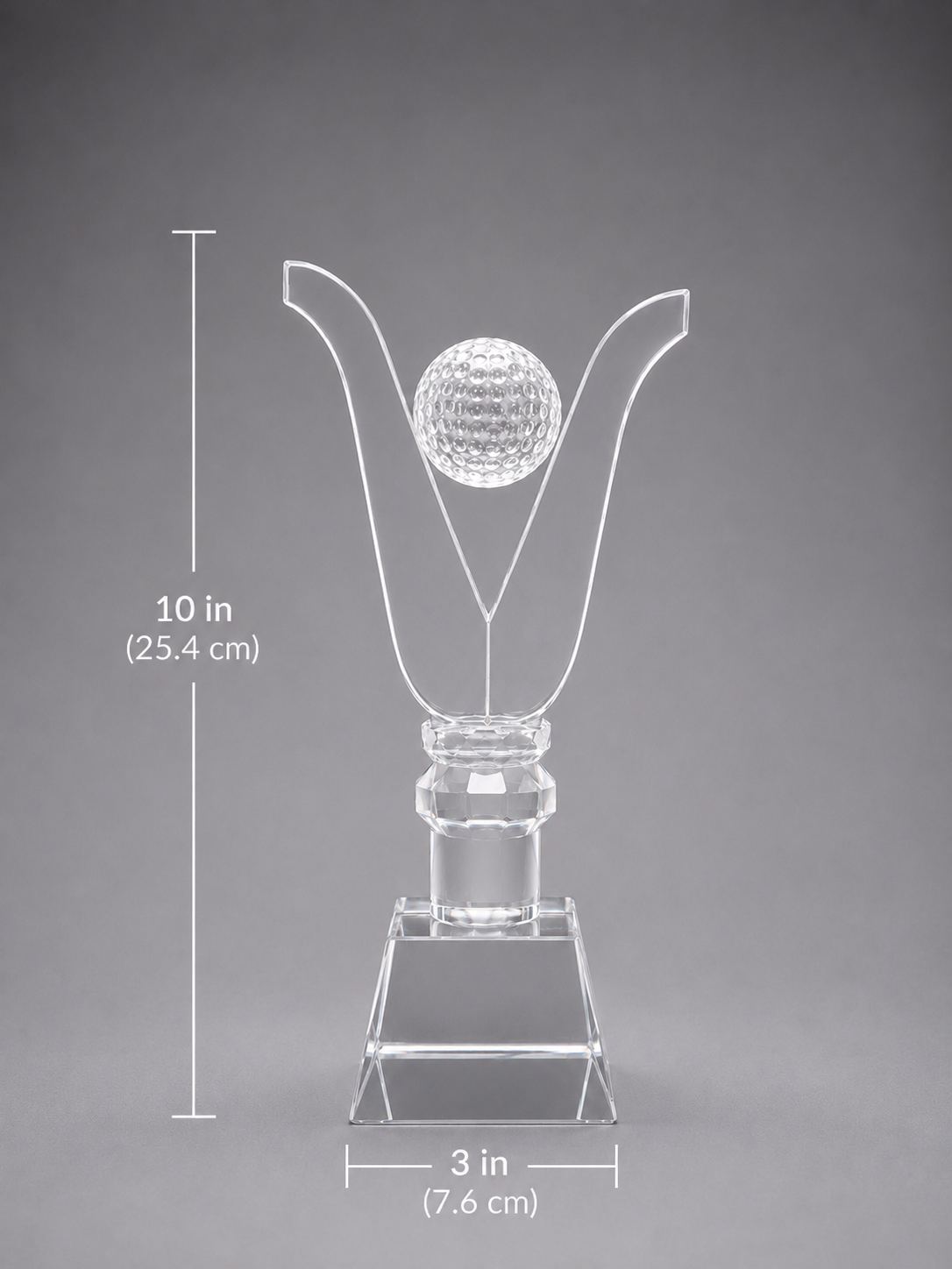 Clear crystal trophy with golf ball design and measurements on a gray background. Base width is 3 inches. Height is 10 inches.