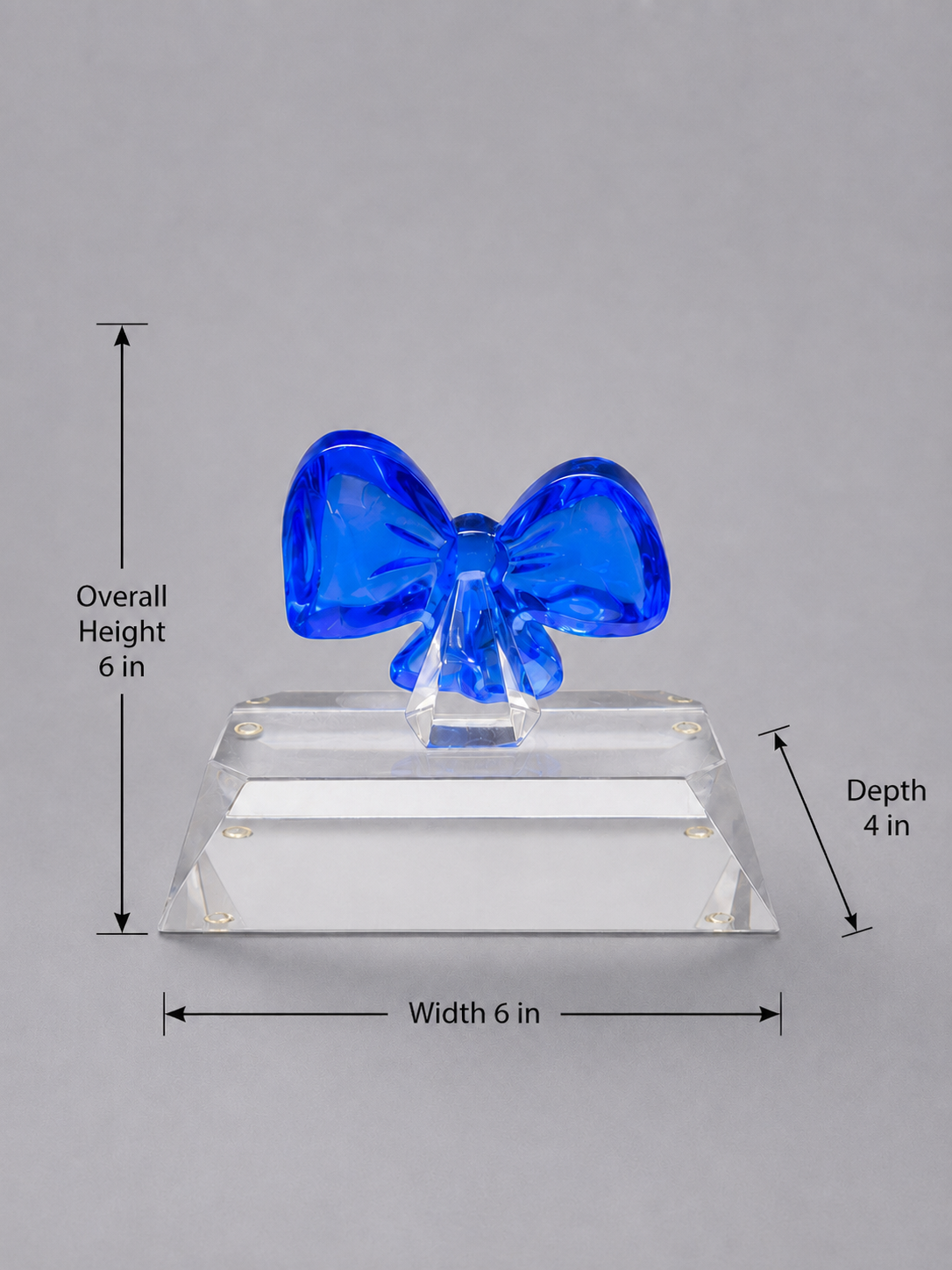 Blue crystal bow on a clear base with labeled dimensions: 6 inches wide, 4 inches deep, and 6 inches high.