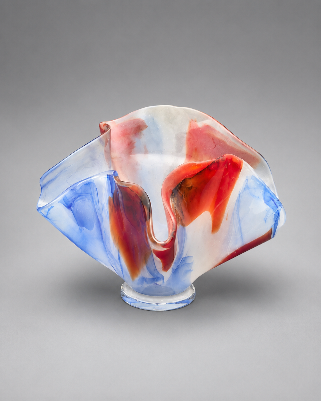 Front view of an exotic multi-color vase that blooms outward