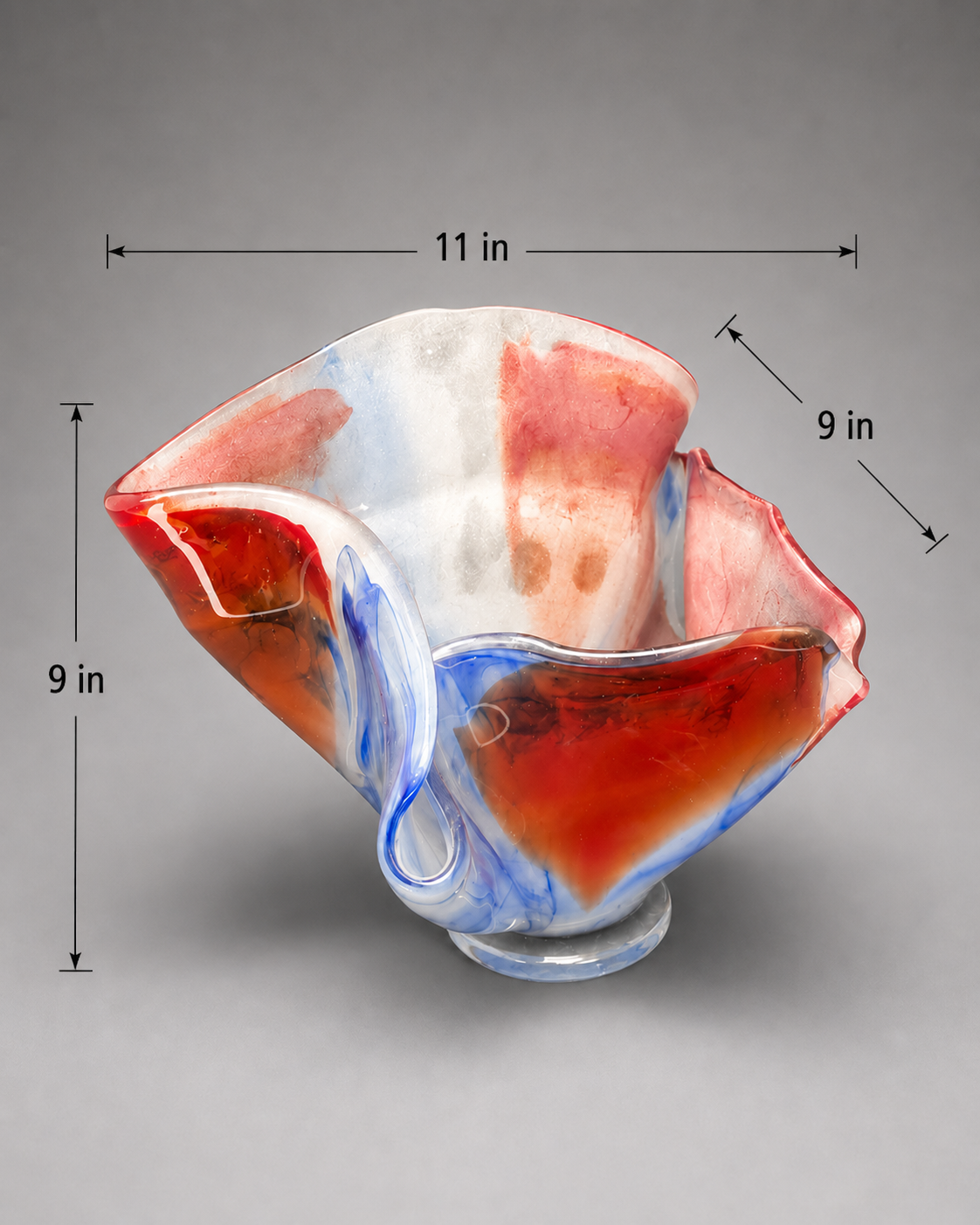 diagonal view of an exotic multi-color vase that blooms outward with measurements given. 9 inches height. 11 inches width. 9 inches long