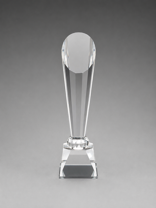Clear glass trophy on a gray background